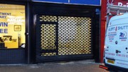 Your Business A New Look Of Security With Punch Hole Roller Shutter